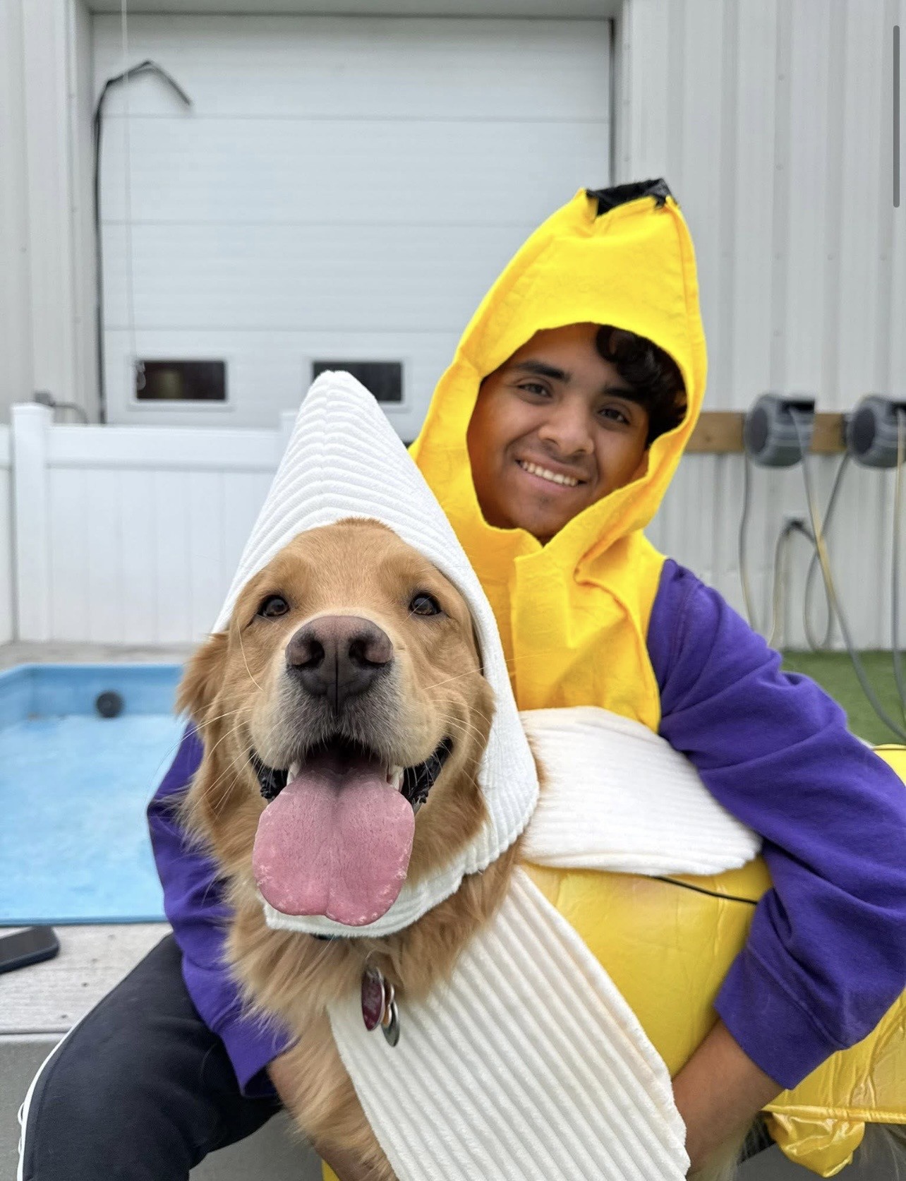 golden retriever and gentleman smiling at camera in banana suits